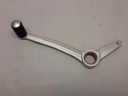 Baksidan på Växelpedal från en BMW S 1000 RR -2014 motorcykel.