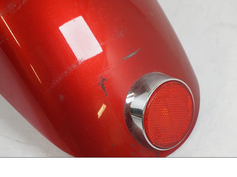 Baksidan på Bakskärm från en Triumph Bonneville -2012 motorcykel.