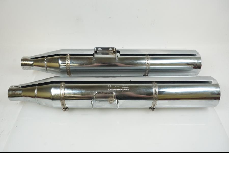 Vänster sida på Ljuddämpare från en H-D Fat Boy -2018 motorcykel.