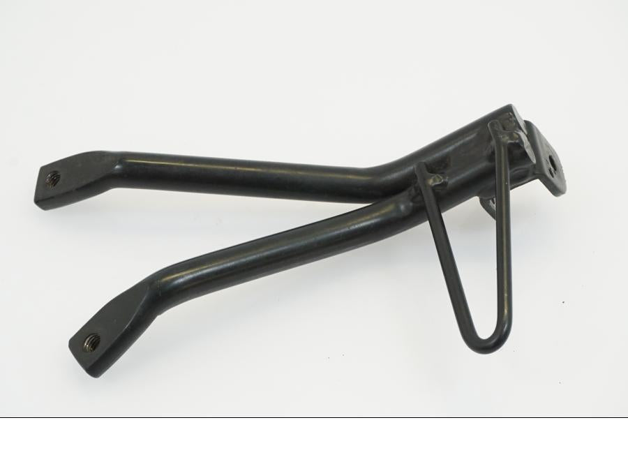 Snett uppifrån på Fotpinnefäste från en Yamaha WR 125 -2010 motorcykel.