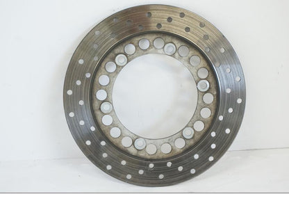 Framsidan på Bromsskiva från en Yamaha TDM 850 -1998 motorcykel.