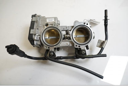 Baksidan på Spjällhus från en Aprilia Tuono V4R -2018 motorcykel.