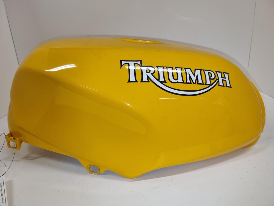 Vänster sida på Bensintank från en Triumph Alla -1999 motorcykel.