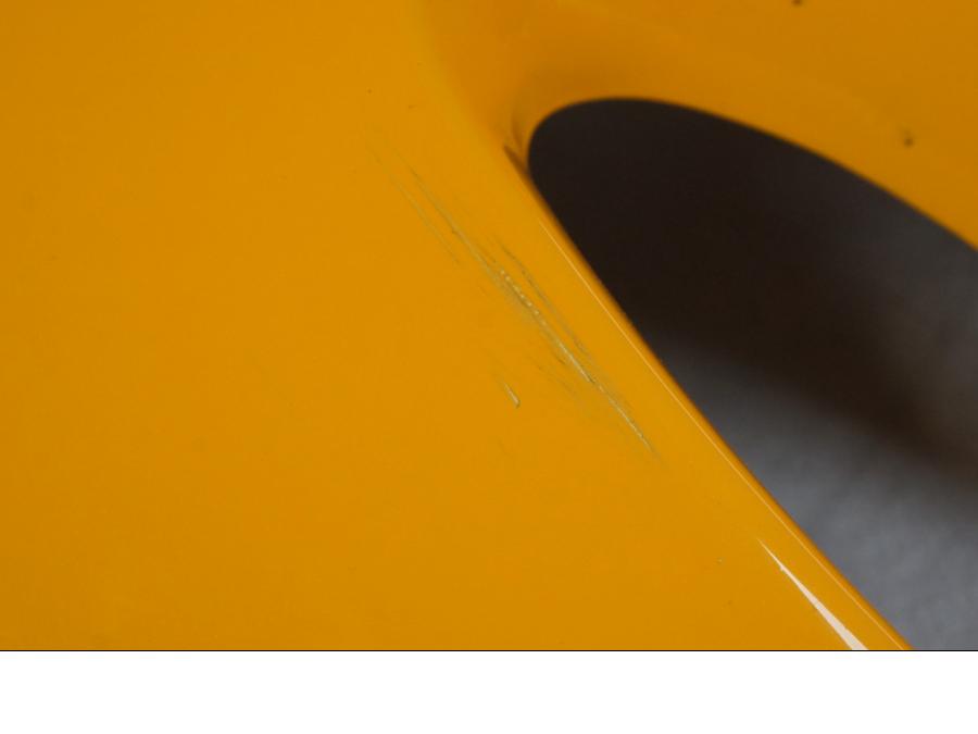 Vänster sida på Toppkåpa från en Suzuki SV 650 -1999 motorcykel.