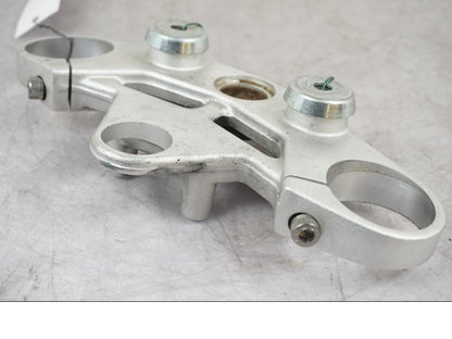 Vänster sida på Gaffelkrona från en Triumph Tiger -2009 motorcykel.