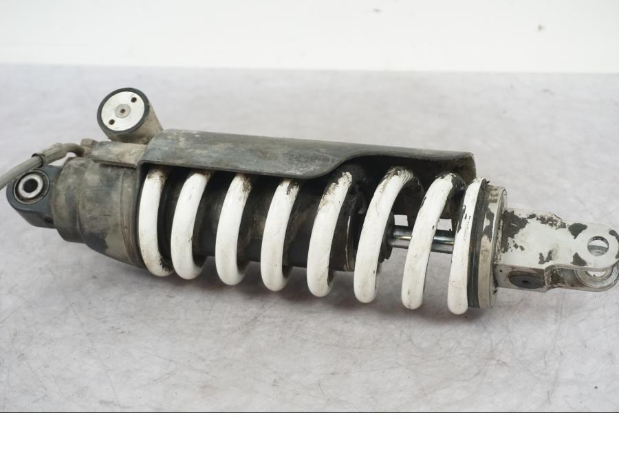 Baksidan på Stötdämpare från en Triumph Tiger Explorer -2016 motorcykel.