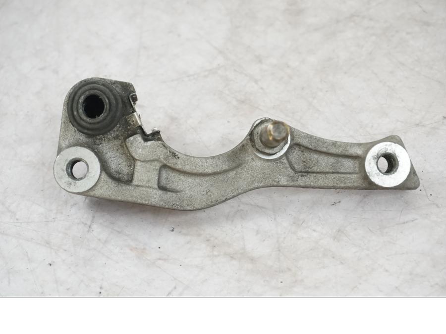 Baksidan på Bromsoksfäste från en Honda XRV 750 -1993 motorcykel.