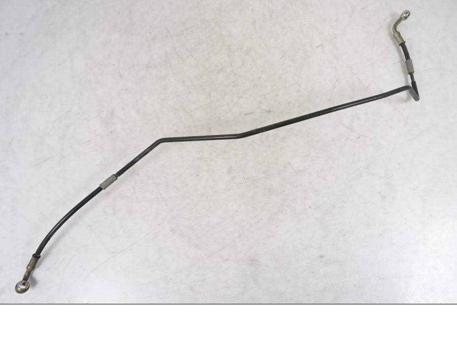 Snett uppifrån på Bromsledning från en Triumph Tiger Explorer -2013 motorcykel.