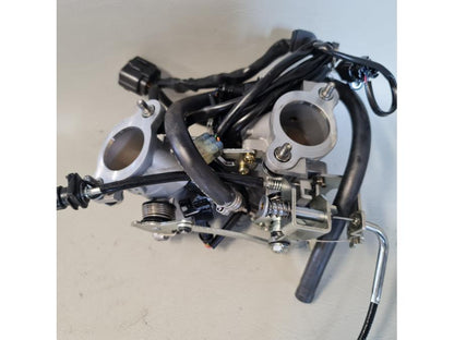 Höger sida på Spjällhus från en Aprilia SXV 550 -2008 motorcykel.