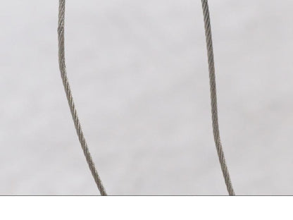 Vänster sida på Gasvajer från en Suzuki GSF 1250 -2010 motorcykel.