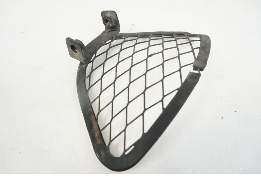 Vänster sida på Trekanten från en Kawasaki ZZR 1100 -1994 motorcykel.