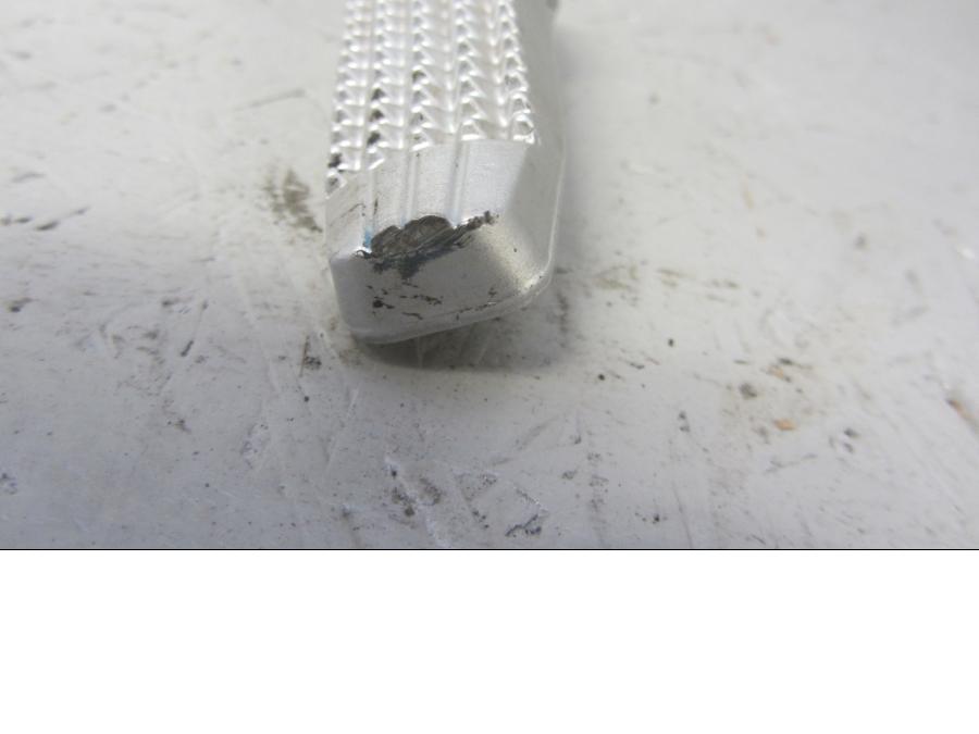 Höger sida på Fotpinne från en BMW F 800 R -2012 motorcykel.