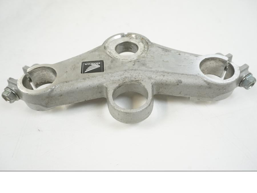 Snett uppifrån på Gaffelkrona från en Honda CBR 125 R -2006 motorcykel.