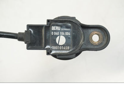 Snett uppifrån på Tändspole från en Ducati Hyperstrada -2013 motorcykel.