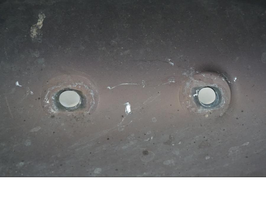 Snett uppifrån på Värmeskydd från en Ducati Streetfighter S -2011 motorcykel.