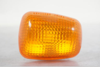 Baksidan på Blinkersglas från en Suzuki SV 650 -1999 motorcykel.