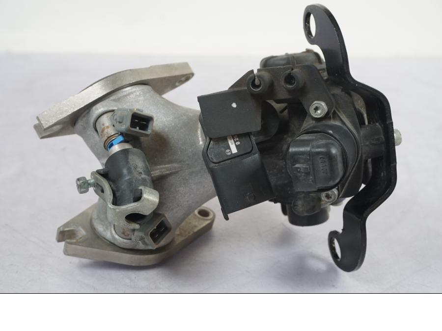 Extrabild3 på Spjällhus från en H-D Sportster 883 XL -2007 motorcykel.