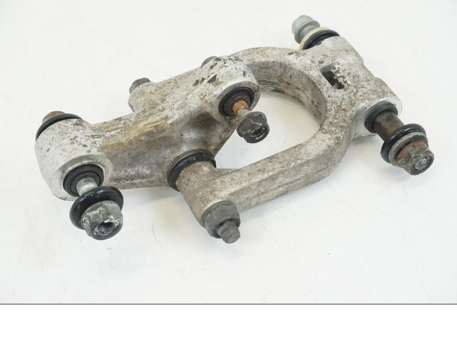 Baksidan på Stötdämparlänkage från en Honda NSR 125 -1991 motorcykel.