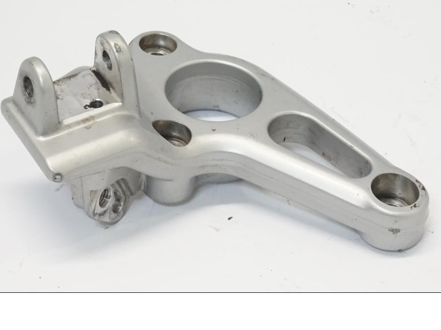 Vänster sida på Fotpinnefäste från en BMW R 1150 RS -2004 motorcykel.