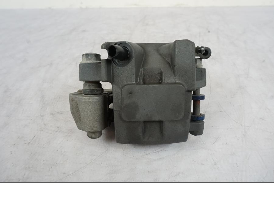 Vänster sida på Bromsok från en Kawasaki Versys 650 -2014 motorcykel.