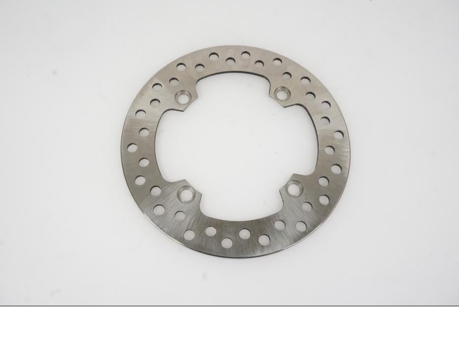 Framsidan på Bromsskiva från en Honda CR 125 -1997 motorcykel.