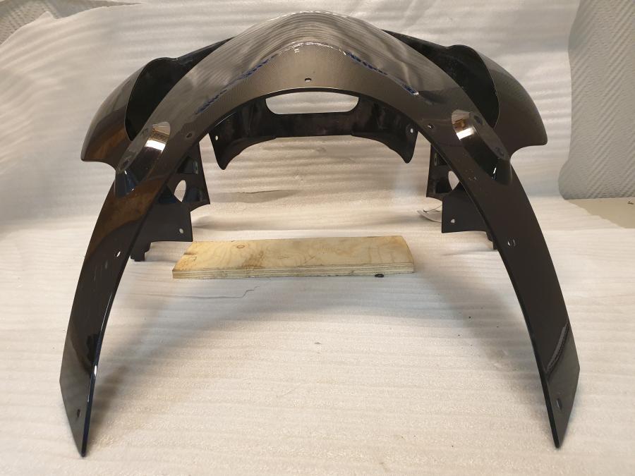 Vänster sida på Toppkåpa från en Honda CBR 900 RR -2003 motorcykel.