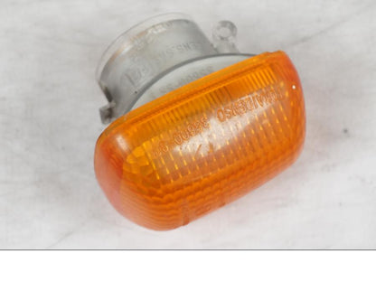 Baksidan på Blinkersglas från en Suzuki SV 650 -1999 motorcykel.