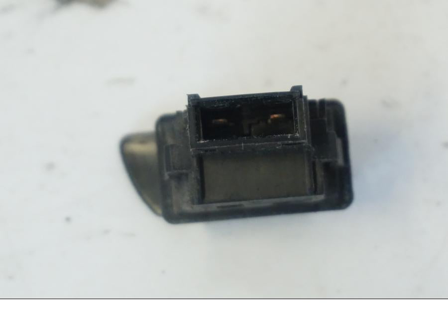 Höger sida på Tryckknappsreglage från en Honda SH 300 A -2011 scooter.