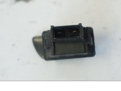 Höger sida på Tryckknappsreglage från en Honda SH 300 A -2011 scooter.