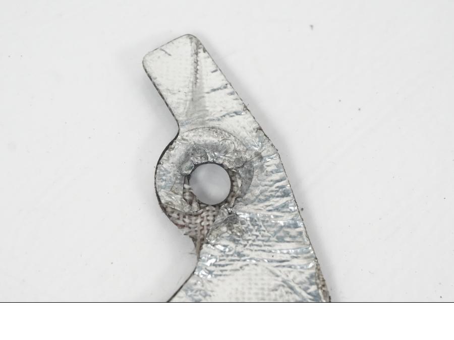 Baksidan på Värmeskydd från en Yamaha YZF 1000 R1 -2007 motorcykel.