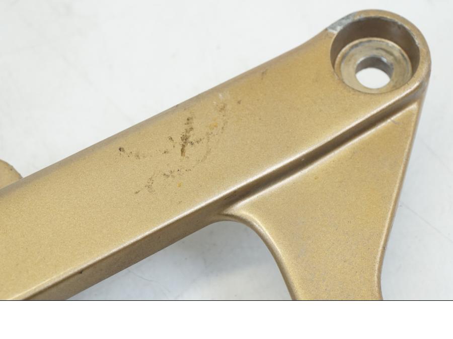 Snett uppifrån på Fotpinnefäste från en Honda NSR 125 -1991 motorcykel.