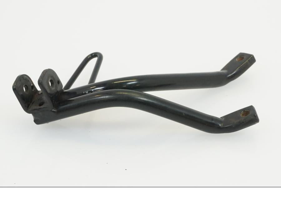 Vänster sida på Fotpinnefäste från en Yamaha WR 125 -2010 motorcykel.