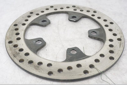 Framsidan på Bromsskiva från en Suzuki SV 650 -2006 motorcykel.