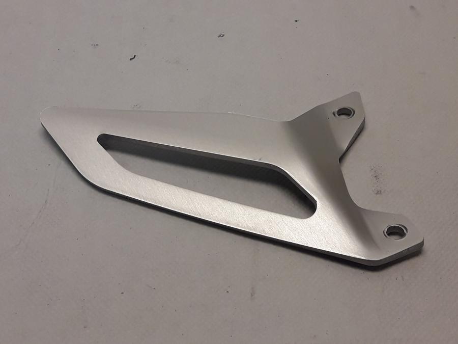 Framsidan på Fotpinnehälskydd från en Ducati 1299 Panigale -2016 motorcykel.