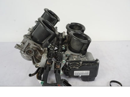 Framsidan på Spjällhus från en Honda VFR 1200 -2010 motorcykel.