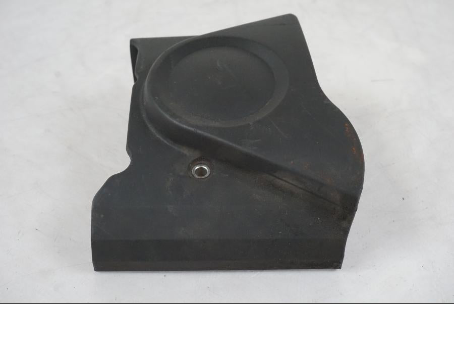 Vänster sida på Drevkåpa från en Honda CBR 125 R -2006 motorcykel.