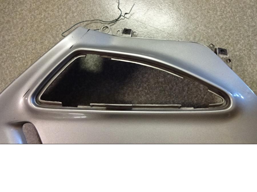 Vänster sida på Sidkåpa från en Honda ST 1100 -1991 motorcykel.