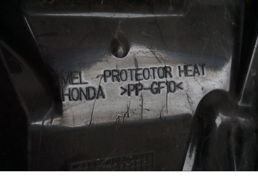 Snett uppifrån på Undertail från en Honda CBR 1000 -2005 motorcykel.