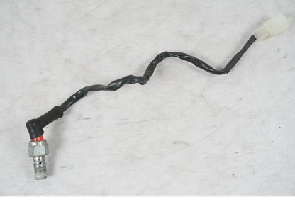 Framsidan på Bromsljuskontakt från en KTM 690 SM R -2009 motorcykel.