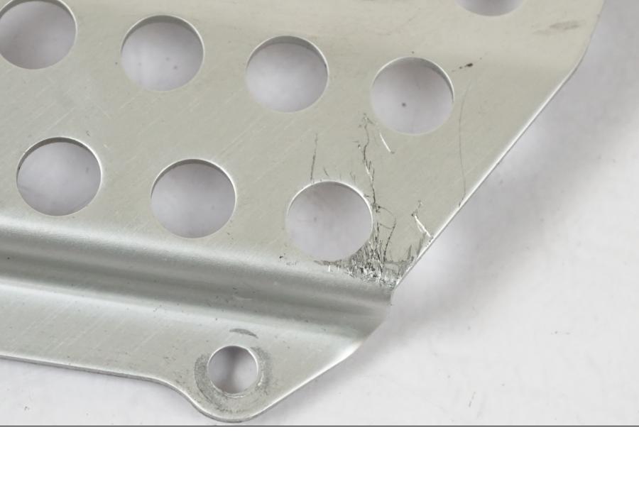 Baksidan på Fotpinnehälskydd från en Honda CBR 1000 RR -2007 motorcykel.