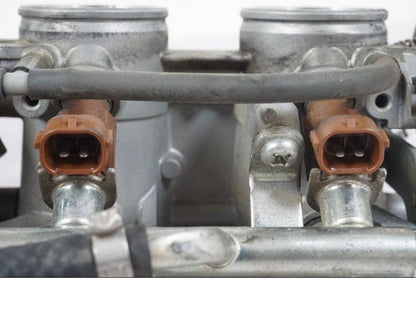 Höger sida på Spjällhus från en Suzuki GSX-R 750 -2007 motorcykel.