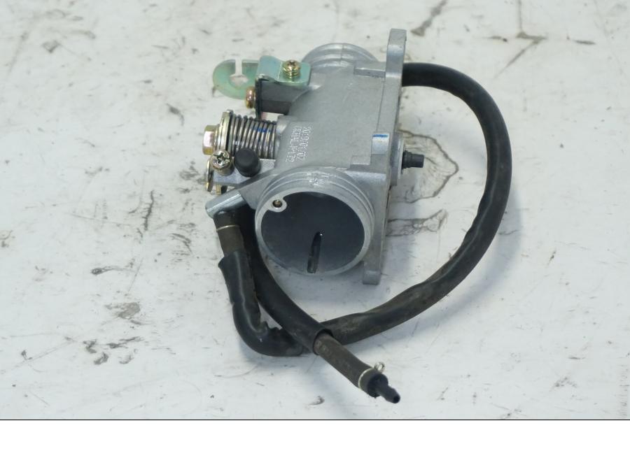 Snett uppifrån på Spjällhus från en Kymco Agility 125 -2019 scooter.