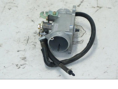 Snett uppifrån på Spjällhus från en Kymco Agility 125 -2019 scooter.