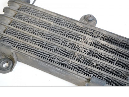 Vänster sida på Oljekyl från en Suzuki SV 1000 -2005 motorcykel.