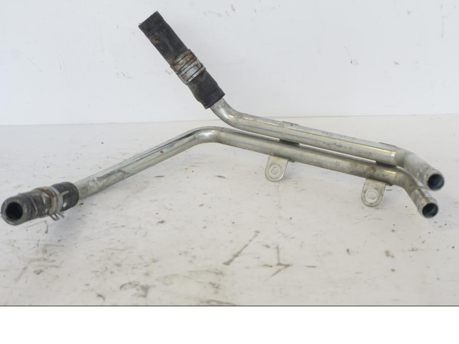 Baksidan på Vattenrör från en Honda SH 300 A -2011 scooter.