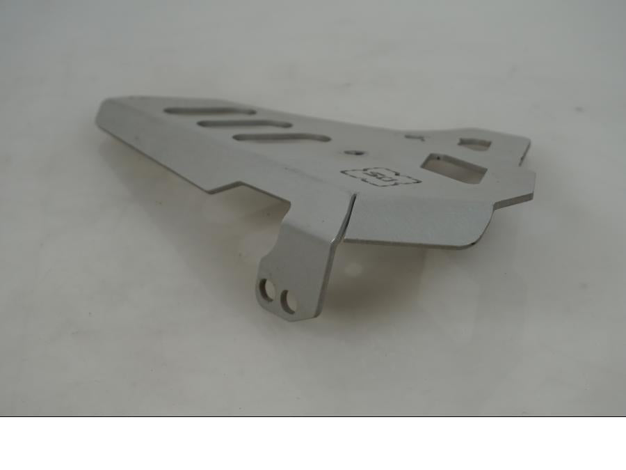 Baksidan på Bromshuvudcylinderskydd från en Yamaha XT 1200 Z -2011 motorcykel.