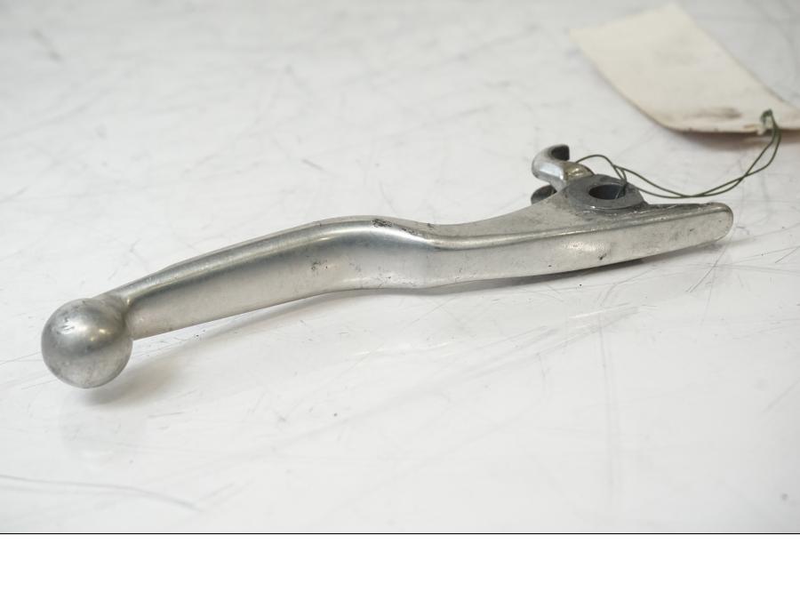 Snett uppifrån på <p>Bromsgrepp från Husqvarna TE 310 2009.</p>

<p>Mindre skrapmärken på knoppen samt ytliga repor se bilder.</p> motorcykel.