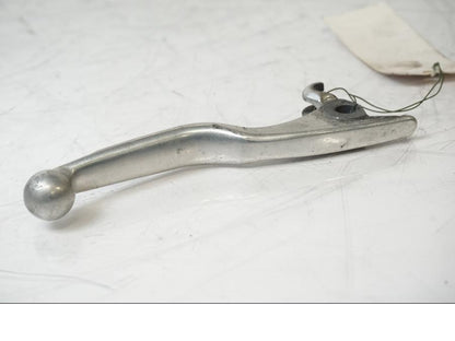 Snett uppifrån på <p>Bromsgrepp från Husqvarna TE 310 2009.</p>

<p>Mindre skrapmärken på knoppen samt ytliga repor se bilder.</p> motorcykel.