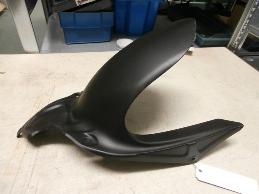 Snett uppifrån på Sving från en Ducati Monster 696 -2013 motorcykel.