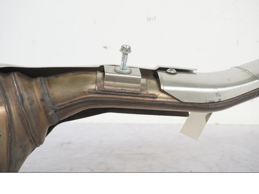 Vänster sida på Ljuddämpare från en Honda CBR 600 RR -2003 motorcykel.